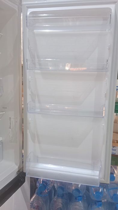 Холодильник почим новый
