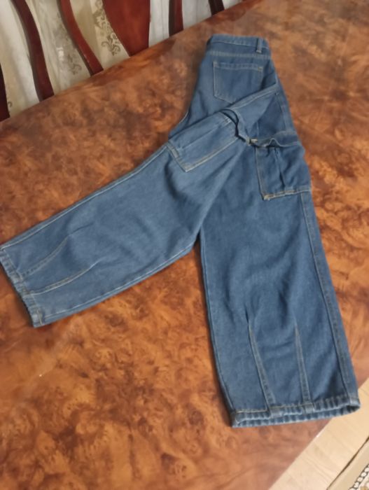 Новые синие джинсы