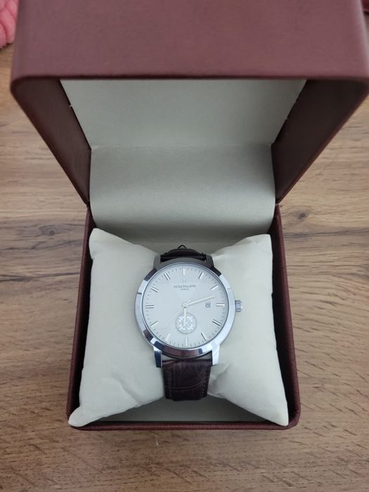 Новые мужские часы