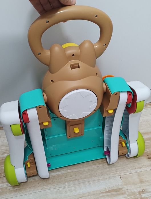 Premergător cu masa de activități pentru bebe