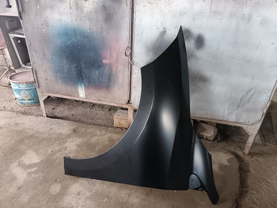 Aripa stânga față Renault Megane 3