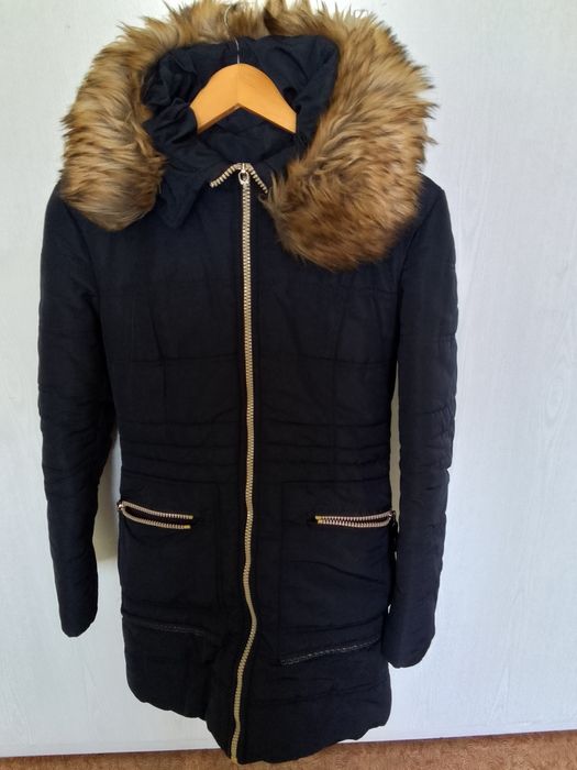 Пуховики женские