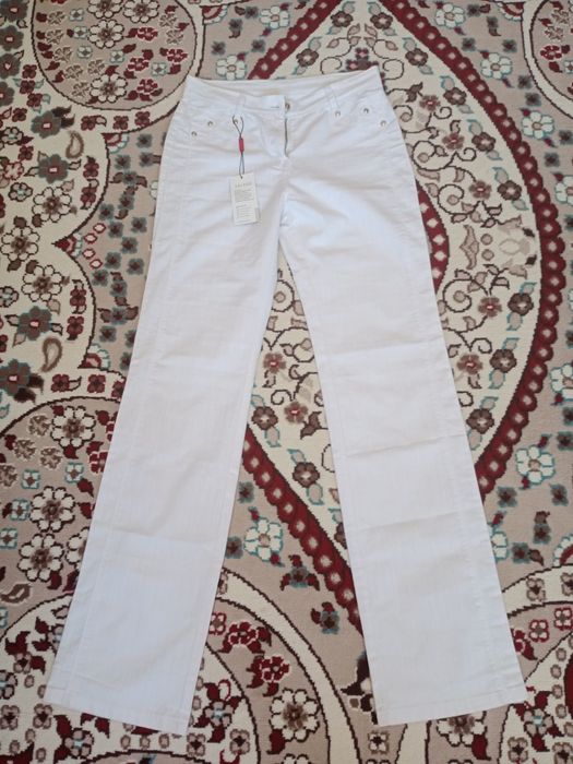 Продам женские джинсы