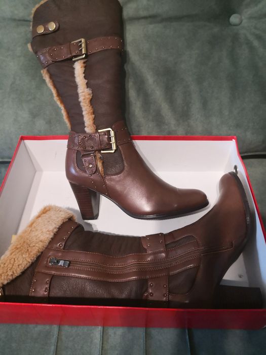 Продам сапоги новые