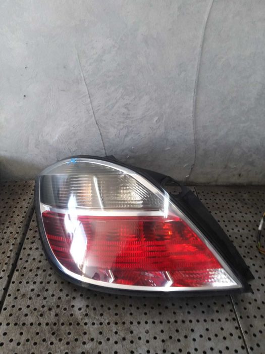 Stop tripla lampa stanga opel astra h a04 13222324 495056087 vp7hlx13405a