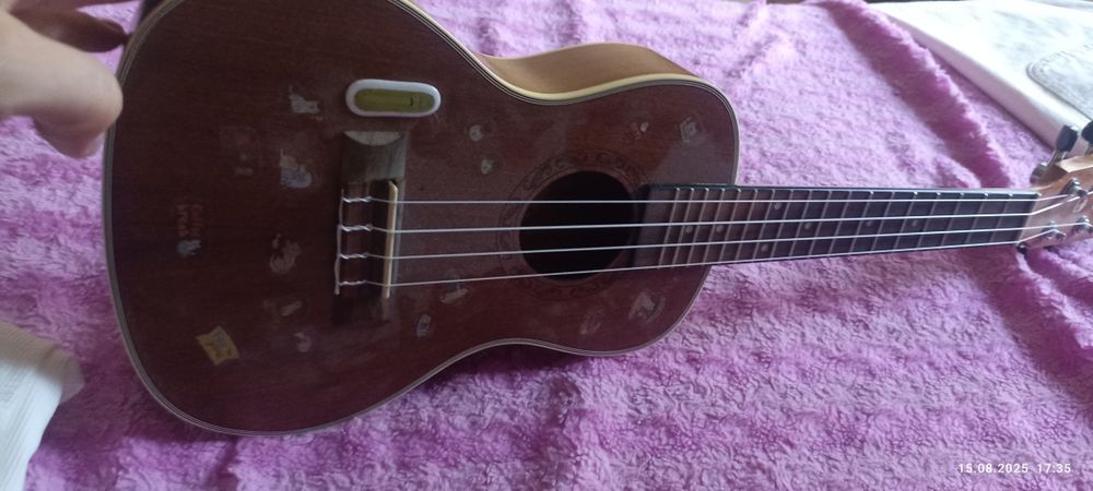 Окулели мини гитара