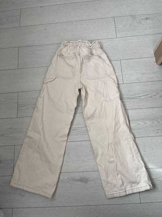 Бели дънки с широк крачол