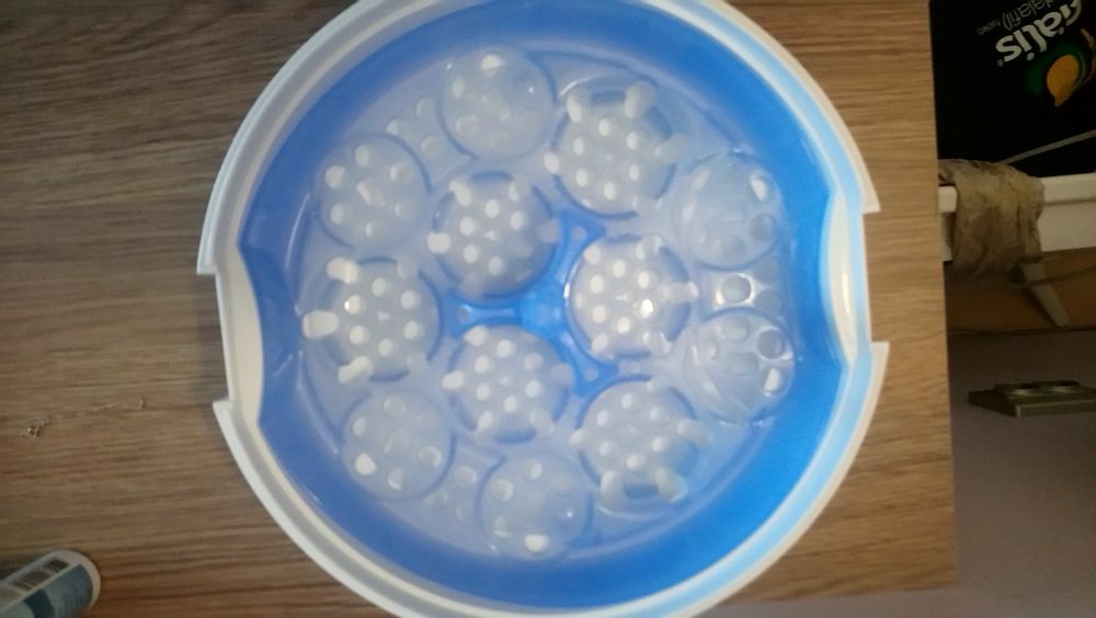 Помпа за кърма и стерилизатор за мокровълнова