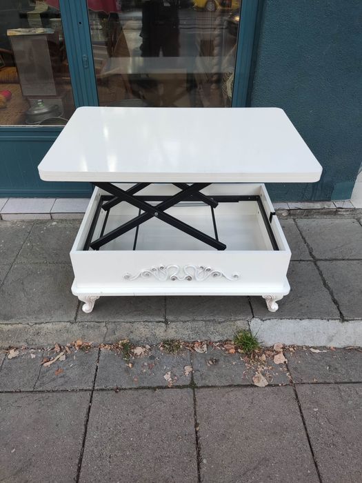 Разстгателна маса на , различни нива