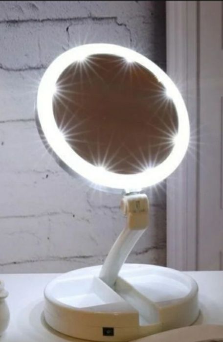 Oglinda cosmetica cu factor de marire