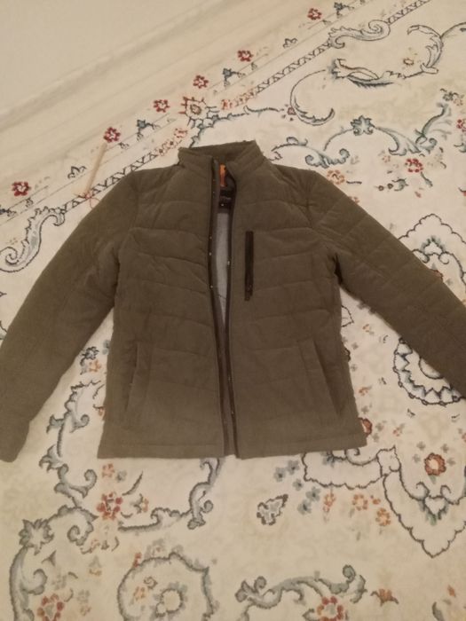 Продам ветровку теплый