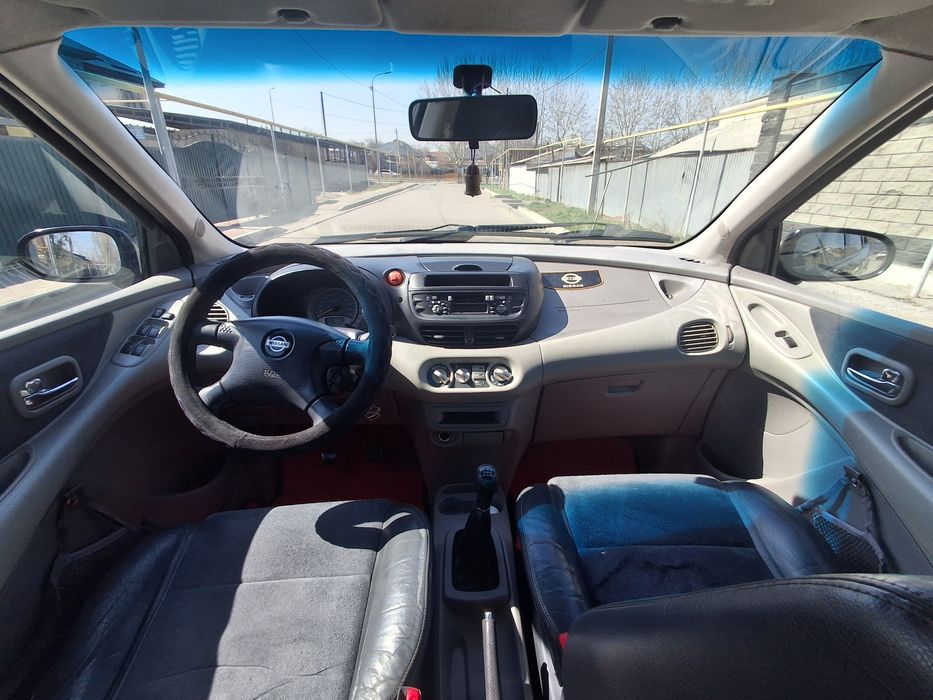 Ниссан алмера тино