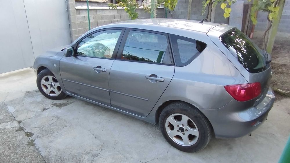 Mazda 3 хечбек бензин