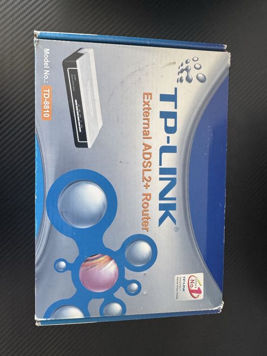 Отдам за шоколадку модем TP-LINK TD-8810