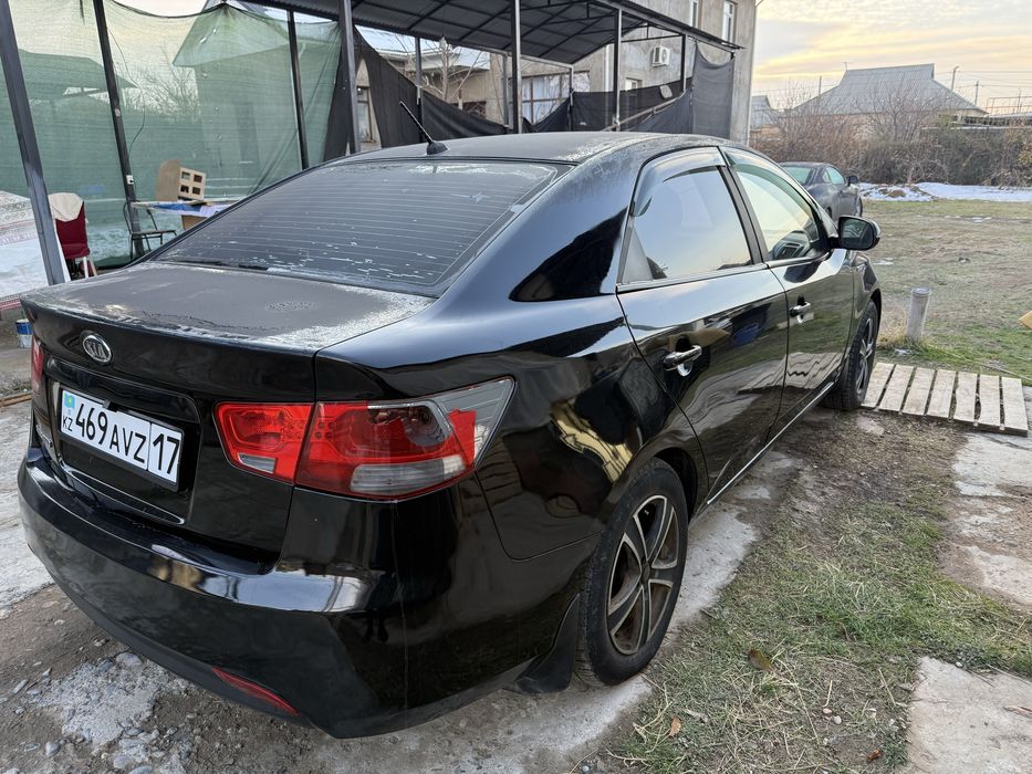 Kia cerato 2011 года