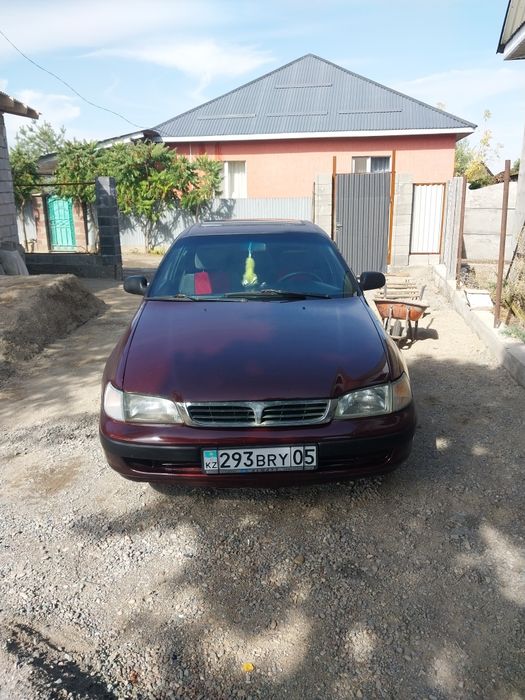 Тайота Карина Е продам