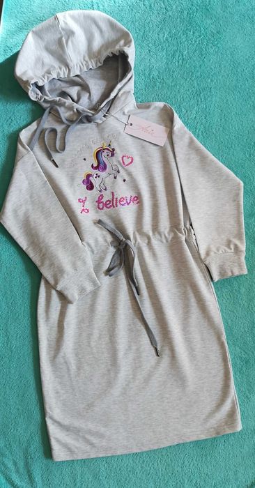 Новое платье на 11-12лет.