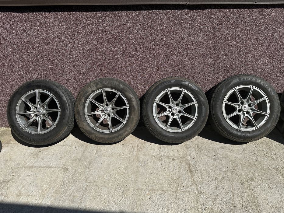 Jante KM cu anvelope Firestone de vara 4x100 r15