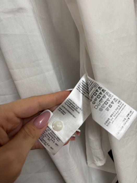 Белая рубашка от Calvin Klein