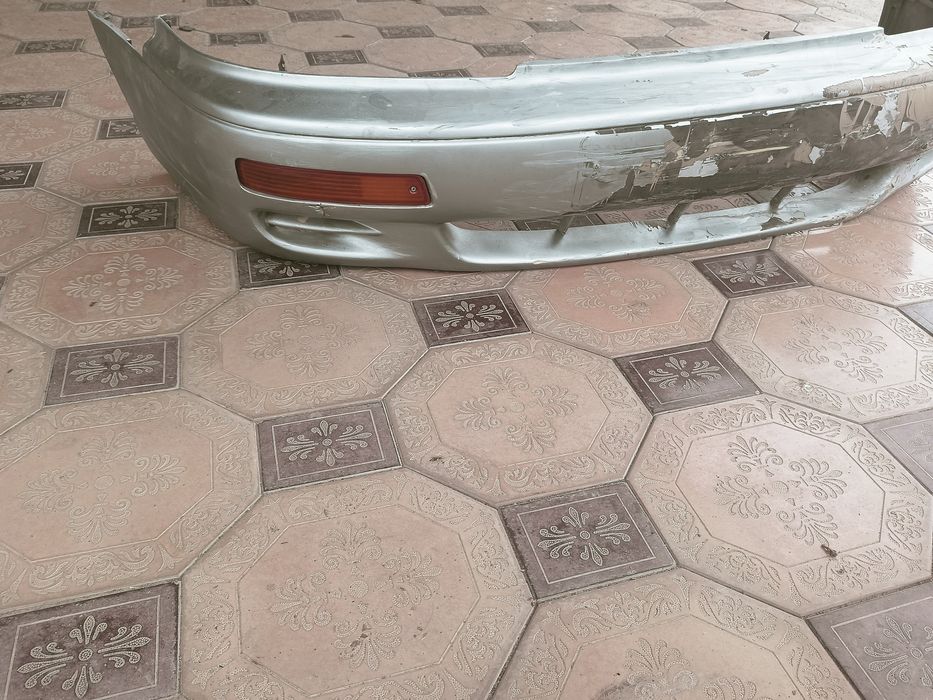 Тойота камри 10-15 бампер