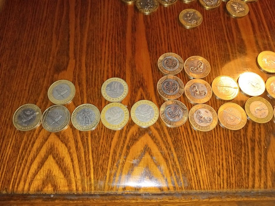 Нумизмат монеты 100 тенге