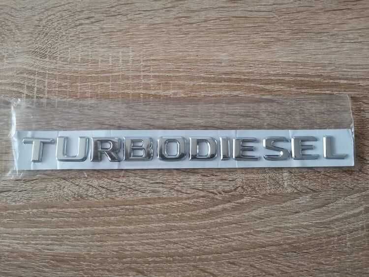 сребрист надпис Mercedes Benz Turbodiesel