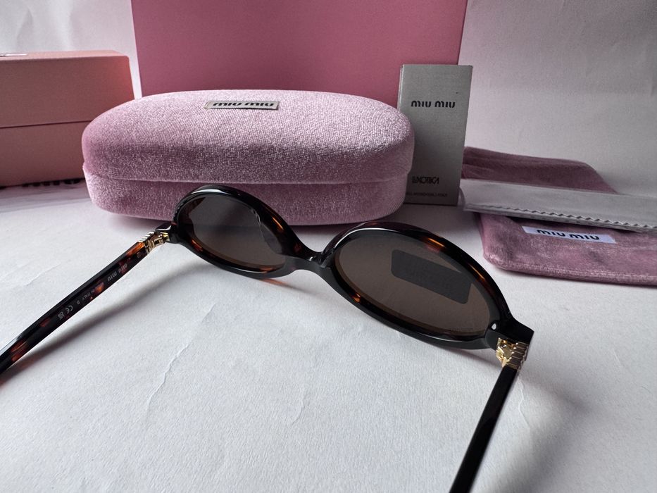 Ochelari de soare Miu Miu Oval SMU04Z 50-18 140, Noi
