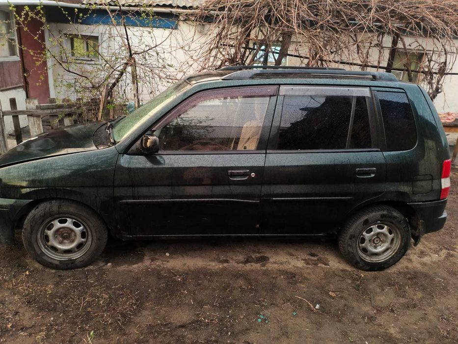 mazda demio 1998