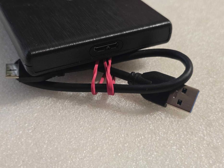 Hard Disk extern slim Orico 1TB, 5400rpm USB 3.0, 2.5" - poze reale