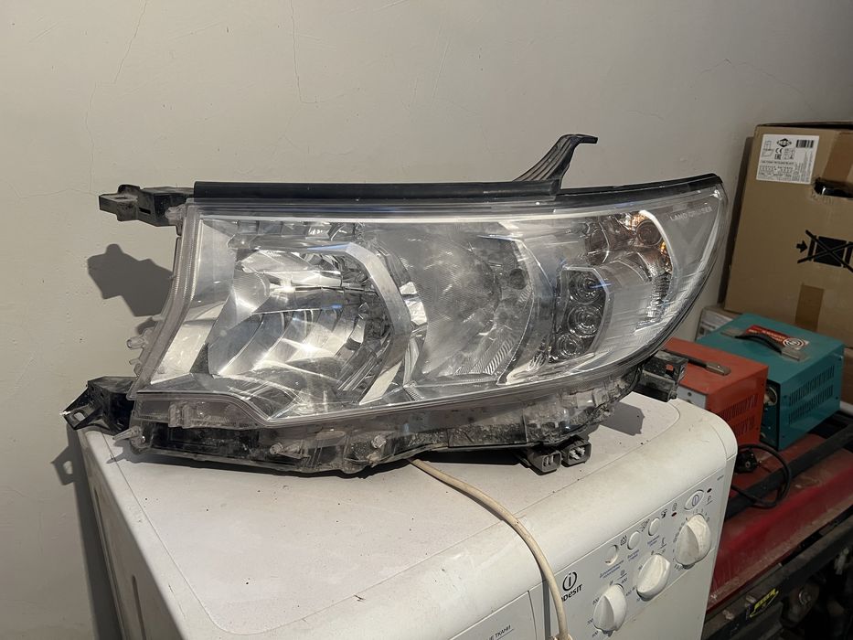 Фара оригинал левая Прадо 150 с лампочками