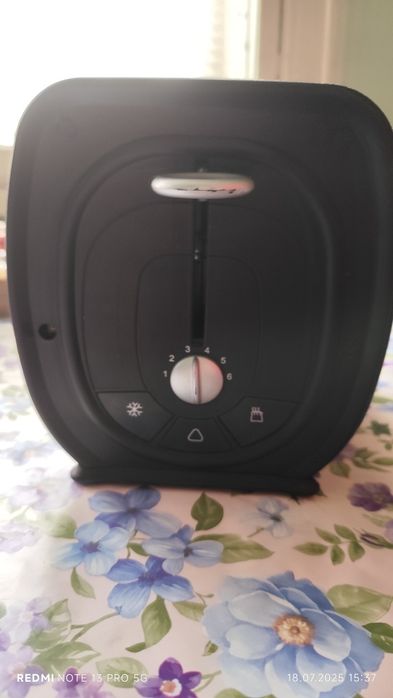 Aparat de pâine Alaska TA3209S - 870 W,2 felii, Negru/Argintiu