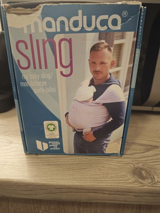 Слинг за носене на бебе