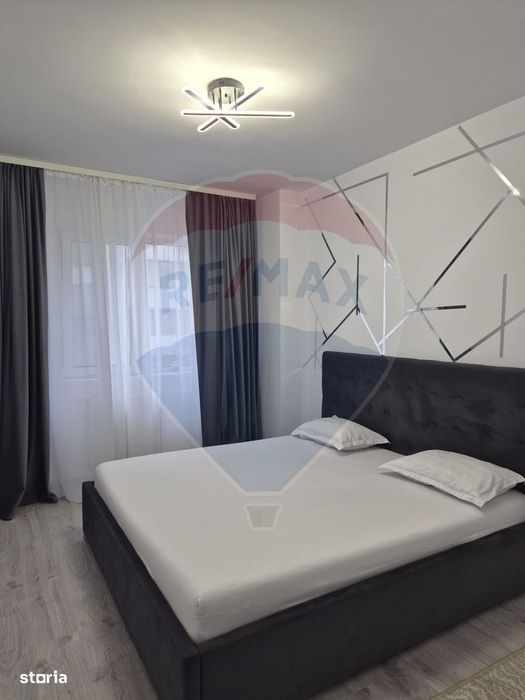 Apartament luminos cu 2 camere, mobilat complet si cu loc de parcare