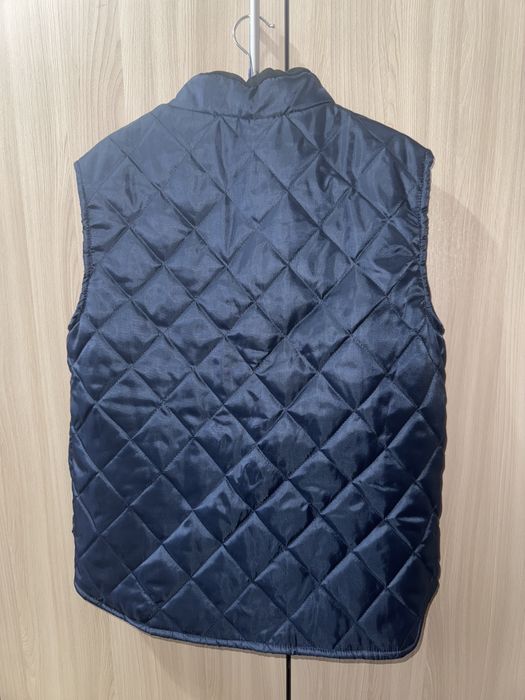 Безрукавка в хорошем состояний.