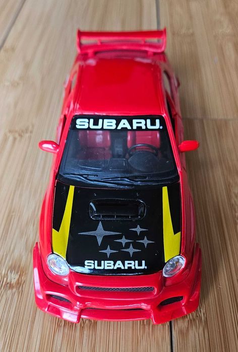 Masina de colectie Bburago Subaru Impreza WRX la scara 1/24 din metal