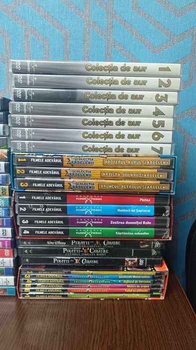 Colectie DVD animatii (79 buc) si filme (23 buc)