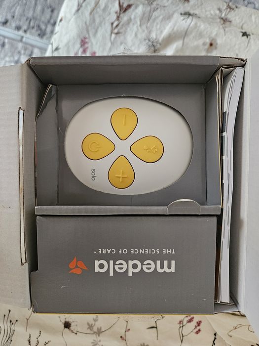 Двуфазна електрическа помпа Medela - Solo Hands - Free