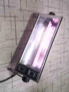 Электрический камин с двумя спиралямив  в хорошем состоянии.