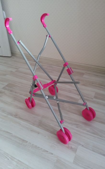 Детская коляска игрушечная