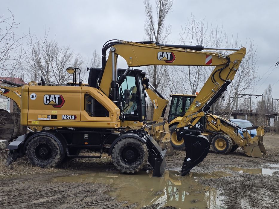 Inchiriez EXCAVATOR pe roti - pneuri