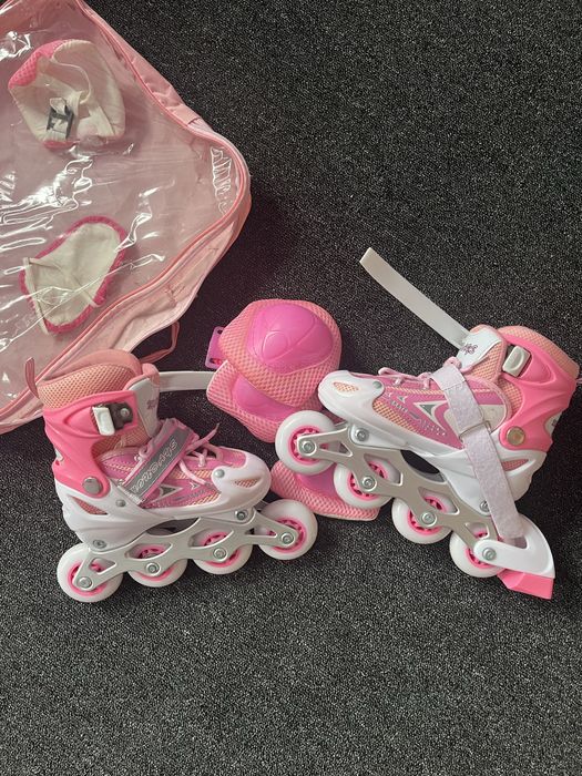 Роликовые коньки