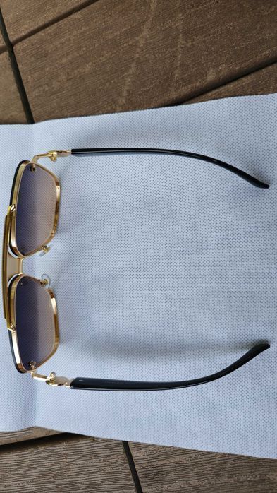Ochelari de soare Verssace gold.