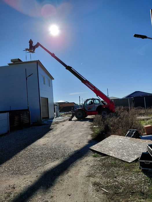 Închiriez Manitou telescopic ridicat materiale