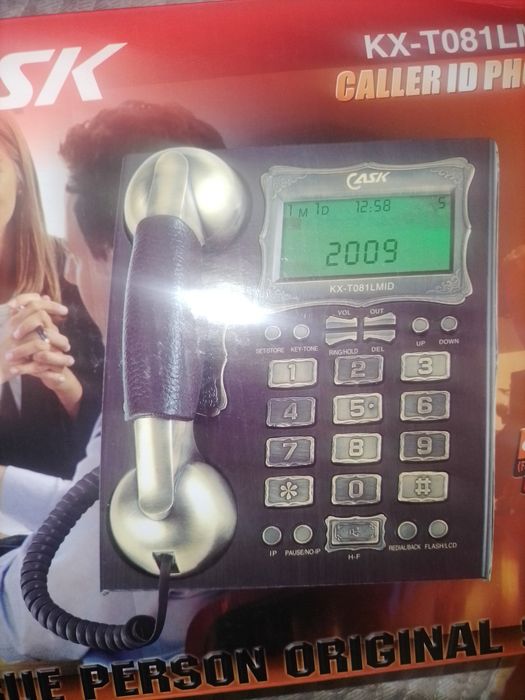 Продам стационарный телефон за 50 000...или обменяю на шоколадку Milky