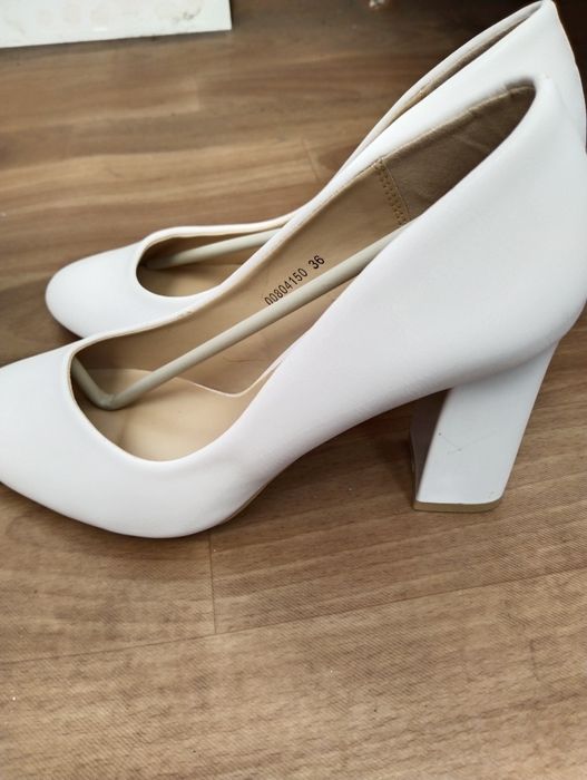 Новые туфли белые