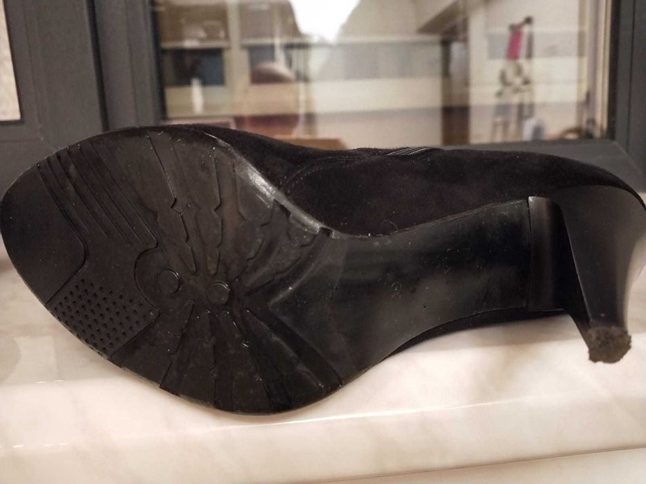 Продам зимние Сапоги.