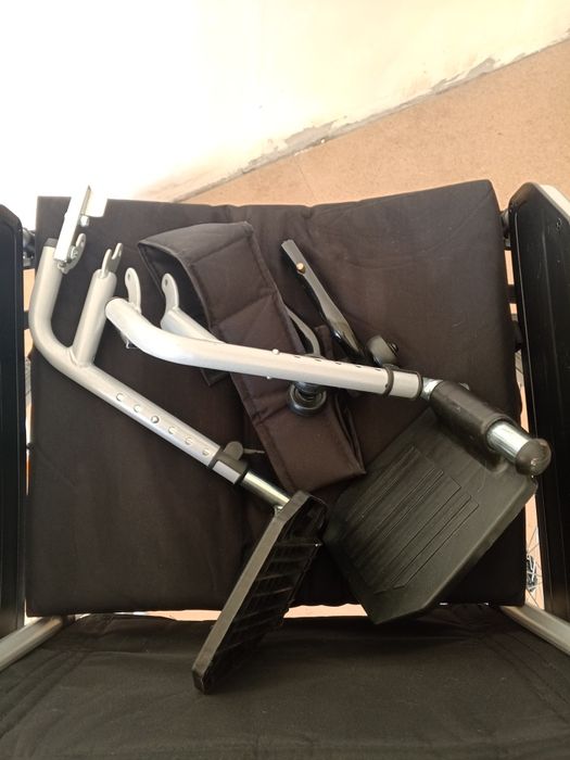 Инвалидная кресло.