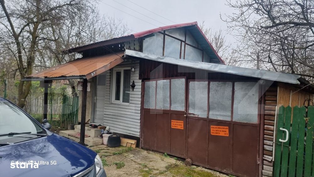TEREN zona aer curat CASA si ANEXA