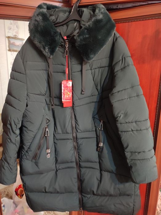 Продам пуховик женский