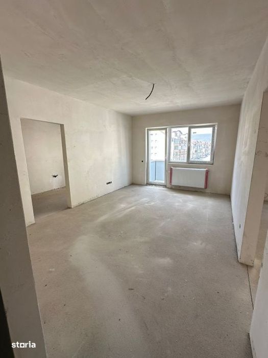 Apartament de 2 camere, SEMIFINISAT, bloc NOU, parcare, Terra — fotografia 1